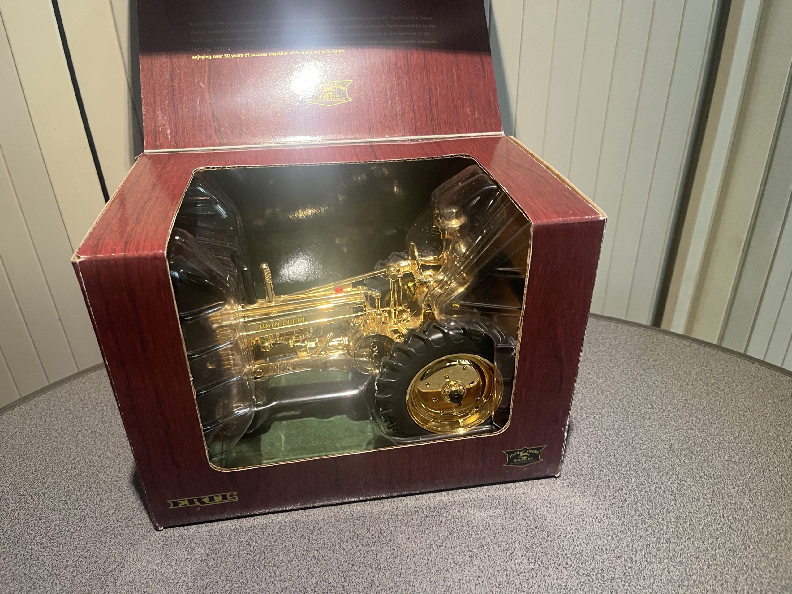 John Deere Model A with Man Ertl